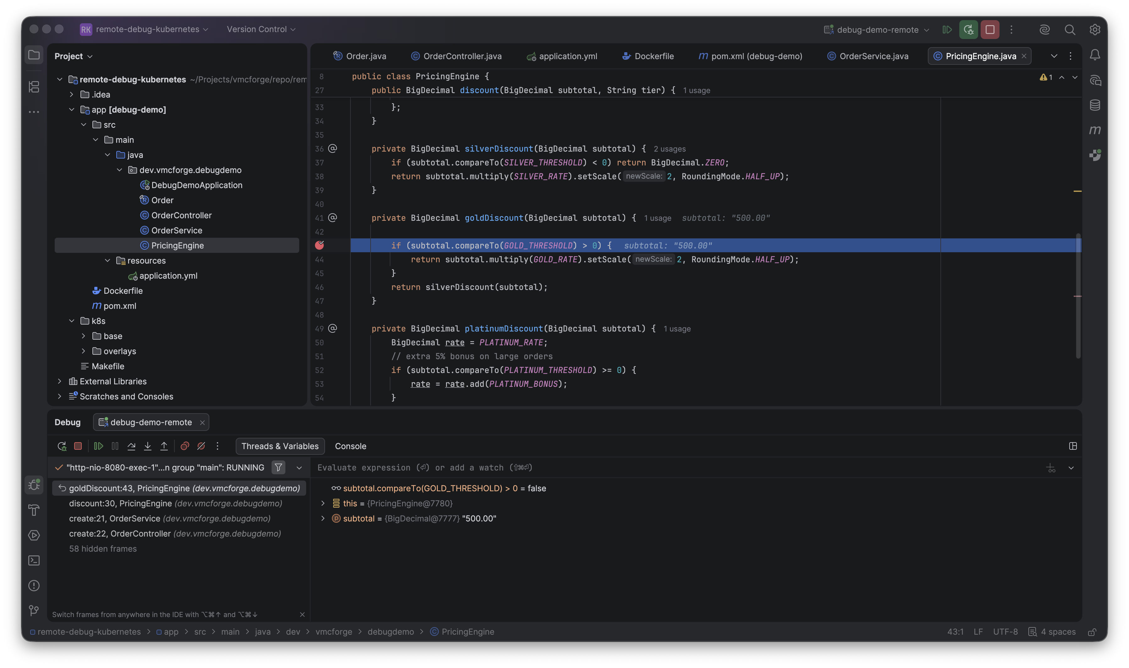 IntelliJ IDEA — breakpoint firing inside the running pod, subtotal and GOLD_THRESHOLD visible in the variables panel